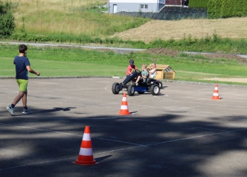 Otwarcie placu zabaw w Gumnach - tor gokartowy