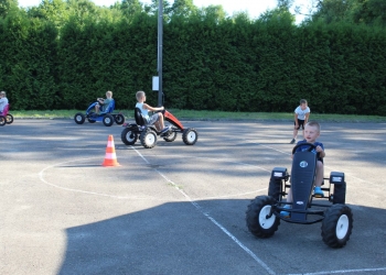 Otwarcie placu zabaw w Gumnach - tor gokartowy